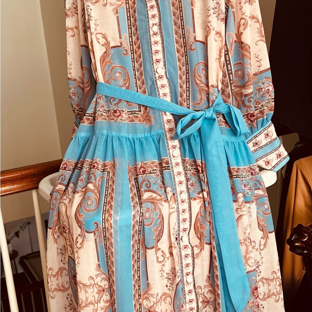 Elegant Blue and Cream Patterned Maxi Dress